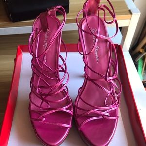 Bright pink strappy heels
